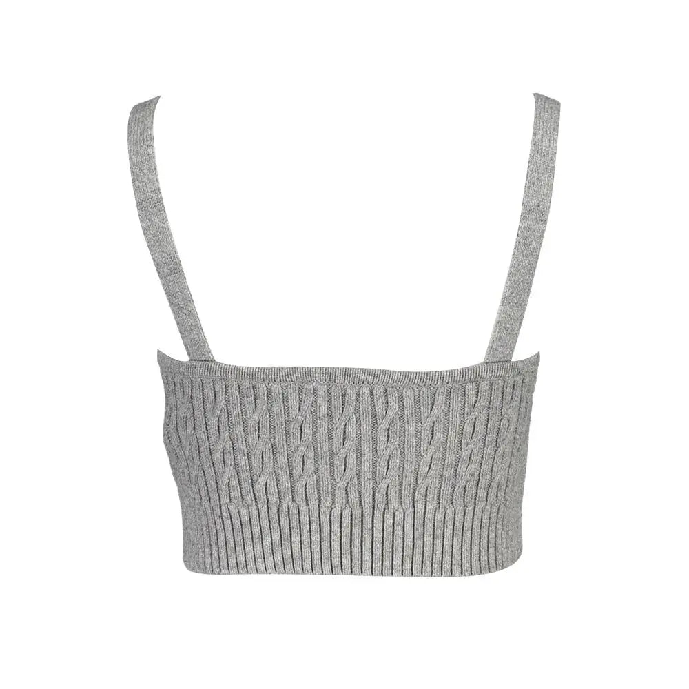 Gray cable knit cropped top with thin straps shown with a tommy hilfiger black polyurethane women handbag