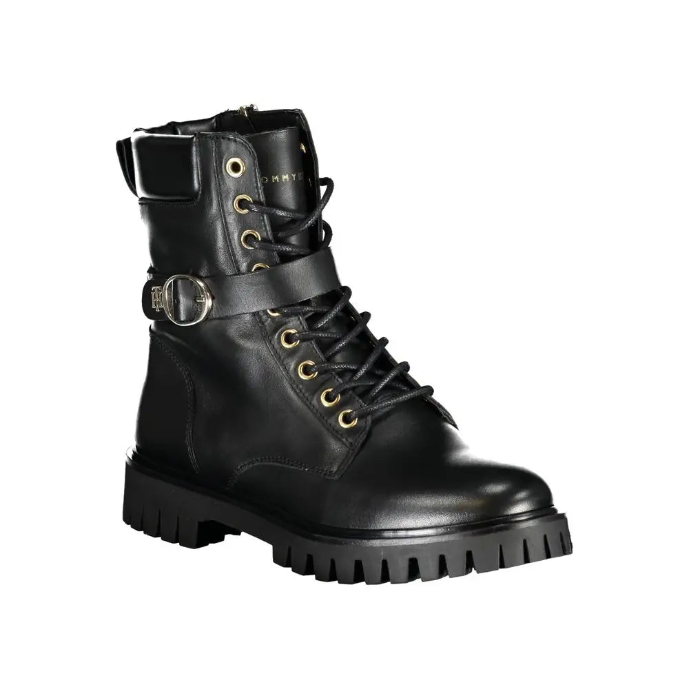 Bottine noire tommy hilfiger en polyuréthane avec boucle argentée et oeillets dorés style combat femme