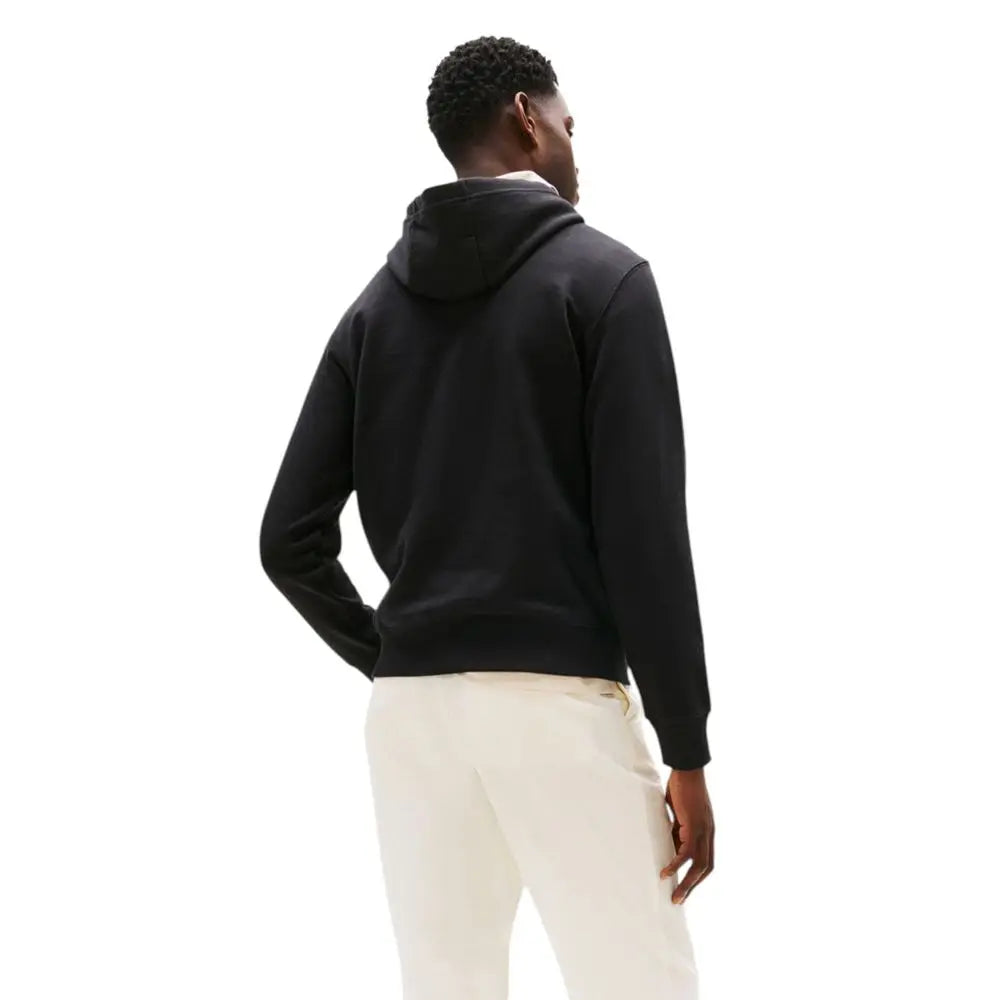 Tommy hilfiger sweat à capuche noir en coton recyclé avec tissu doux et poignets côtelés subtils
