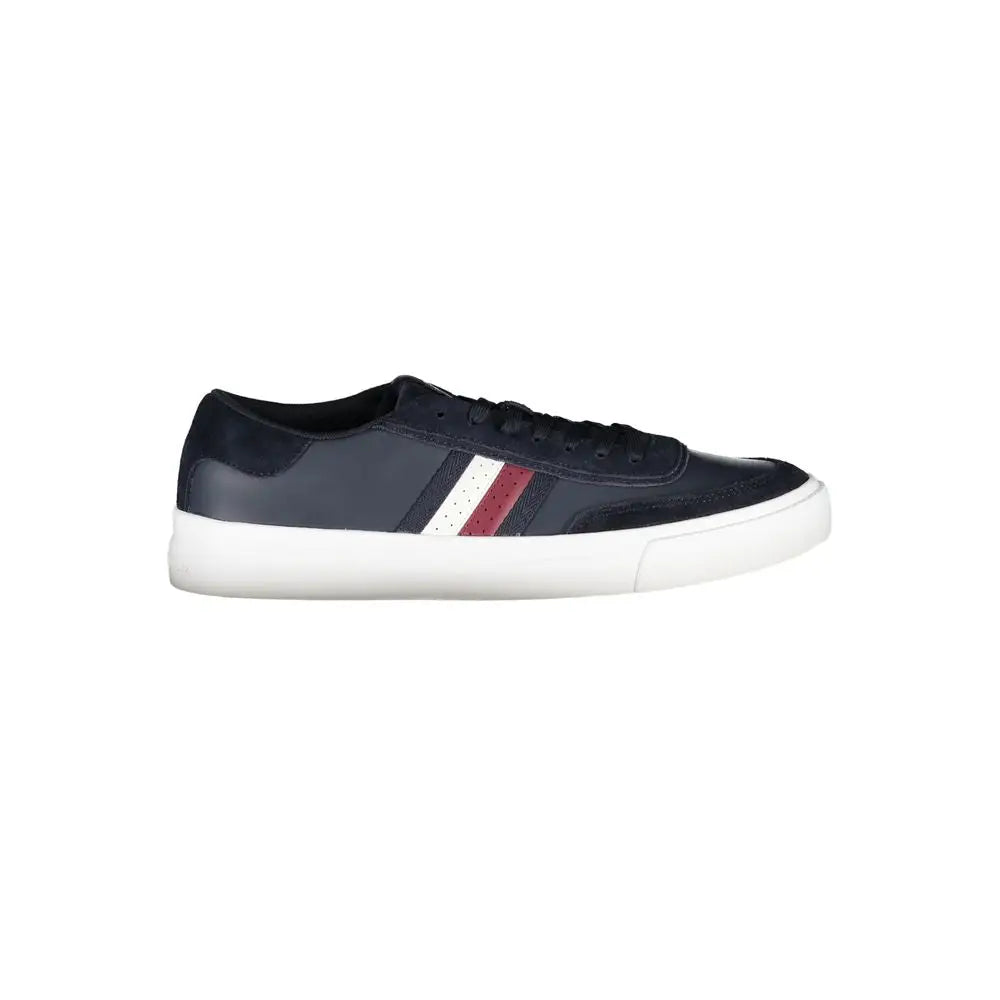 Navy blue leather low-top sneaker with white and red striped side panel accents by Tommy Hilfiger