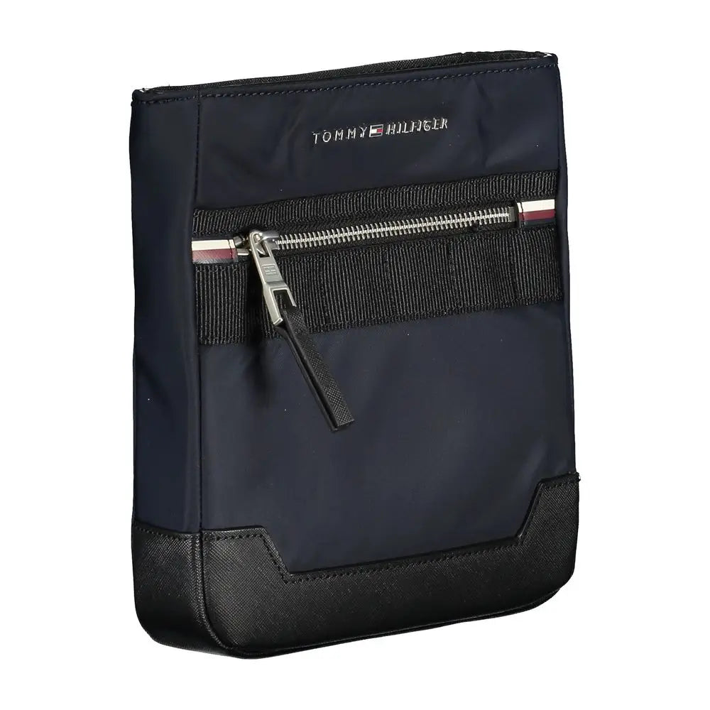 Sac bandoulière homme tommy hilfiger bleu marine polyester avec coins renforcés noirs et fermeture éclair argentée