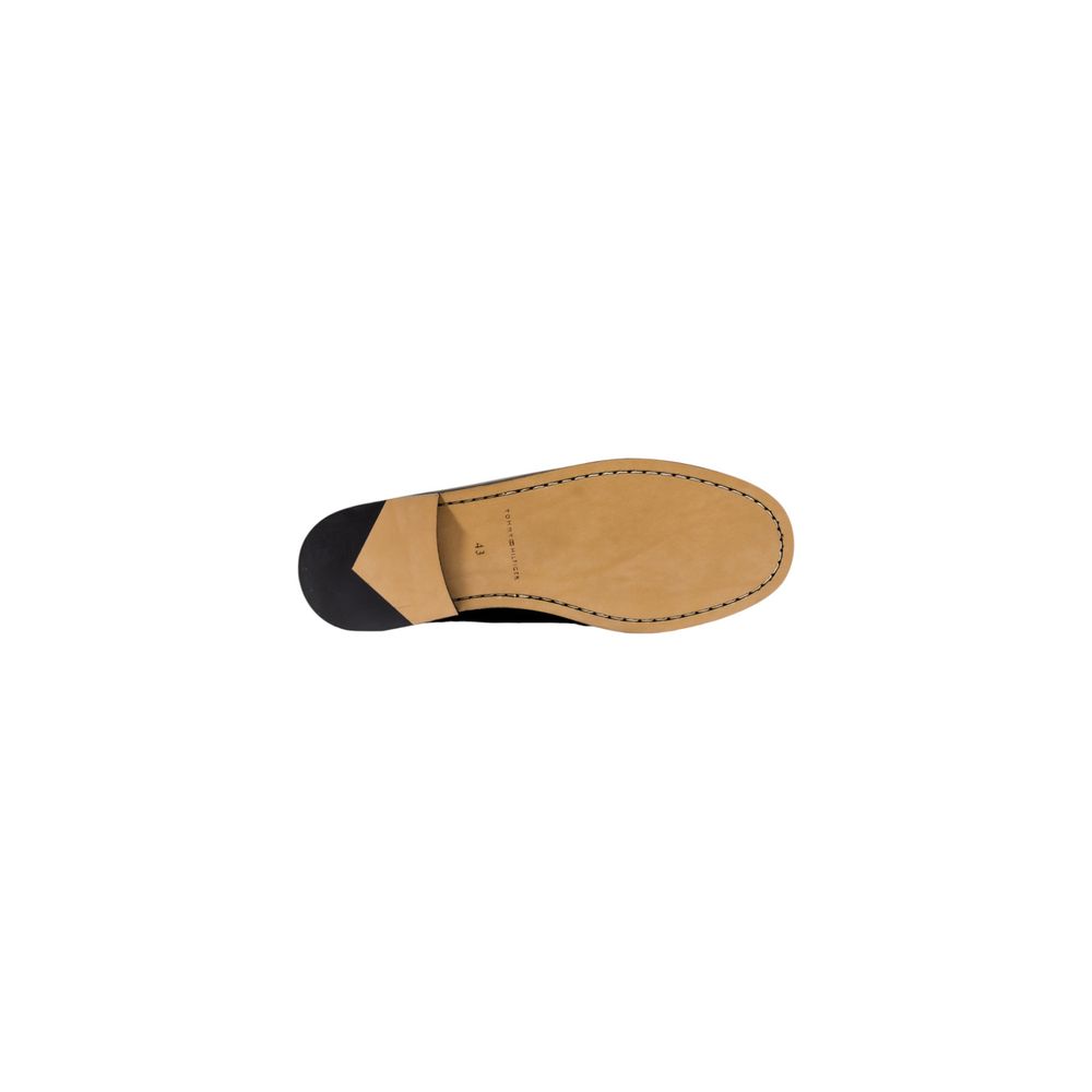 Chaussures loafers en cuir noir de Tommy Hilfiger, slip-on, élégantes et confortables pour homme.