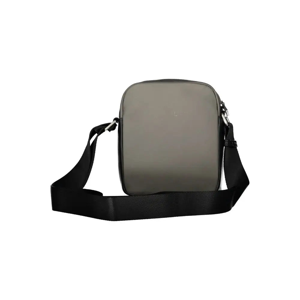 Tommy hilfiger sac bandoulière gris mat en polyester avec sangle noire réglable et ferrures argentées