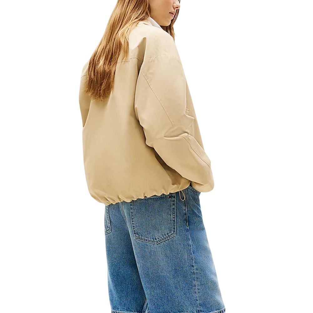 Veste bomber beige en coton de Tommy Hilfiger, vue de face avec détails de fermeture et col côtelé.