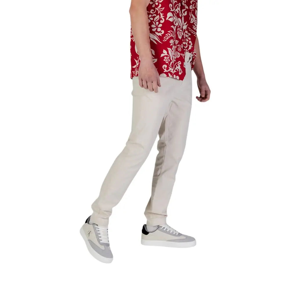 Jeans beige slim fit en coton tommy hilfiger avec coupe moderne et épurée