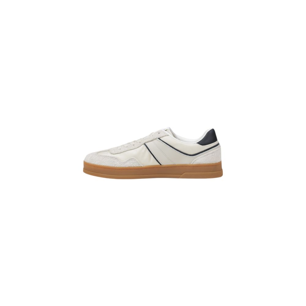 Chaussures Tommy Hilfiger Jeans en cuir beige, baskets basses à lacets, vue de face sur des sneakers décontractés.