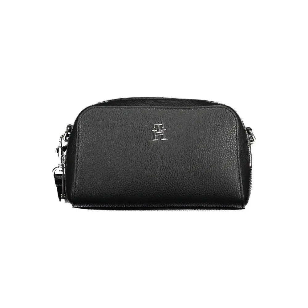 Sac bandoulière noir en cuir grainé avec logo tommy hilfiger argenté et détails de fermeture éclair