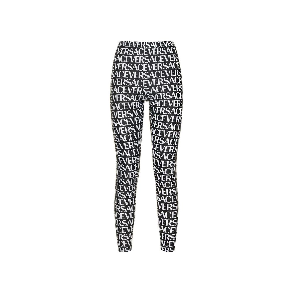 Leggings noires en élasthanne de la marque Versace, ajustées et confortables, visibles en détail sur l'image.