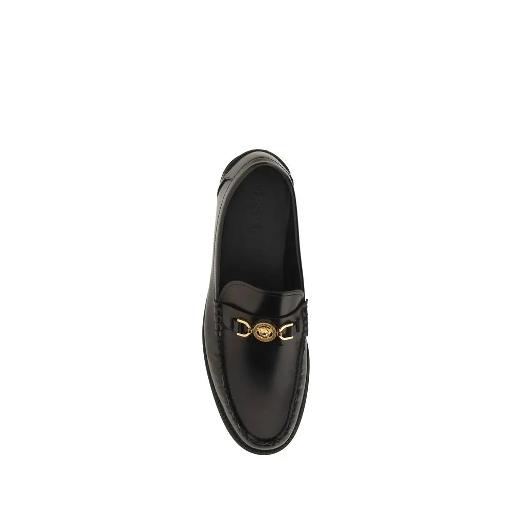 Versace black calf leather bos taurus slip-on loafers with gold-tone medusa head buckle