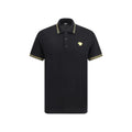 Versace polo noir en coton avec bordure dorée sur col et manches et logo medusa brodé sur la poitrine gauche