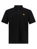 Versace black cotton polo shirt with gold medusa head emblem on the chest and black buttons
