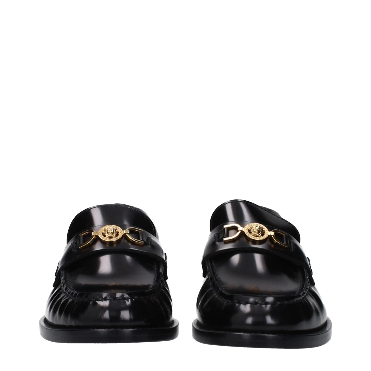 Versace black leather slip-on loafers en cuir verni noir avec boucle tête de medusa dorée