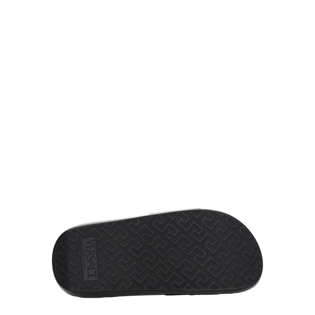 Semelle noire en caoutchouc avec logo versace en relief et motif géométrique répétitif pour slippers en cuir noir versace