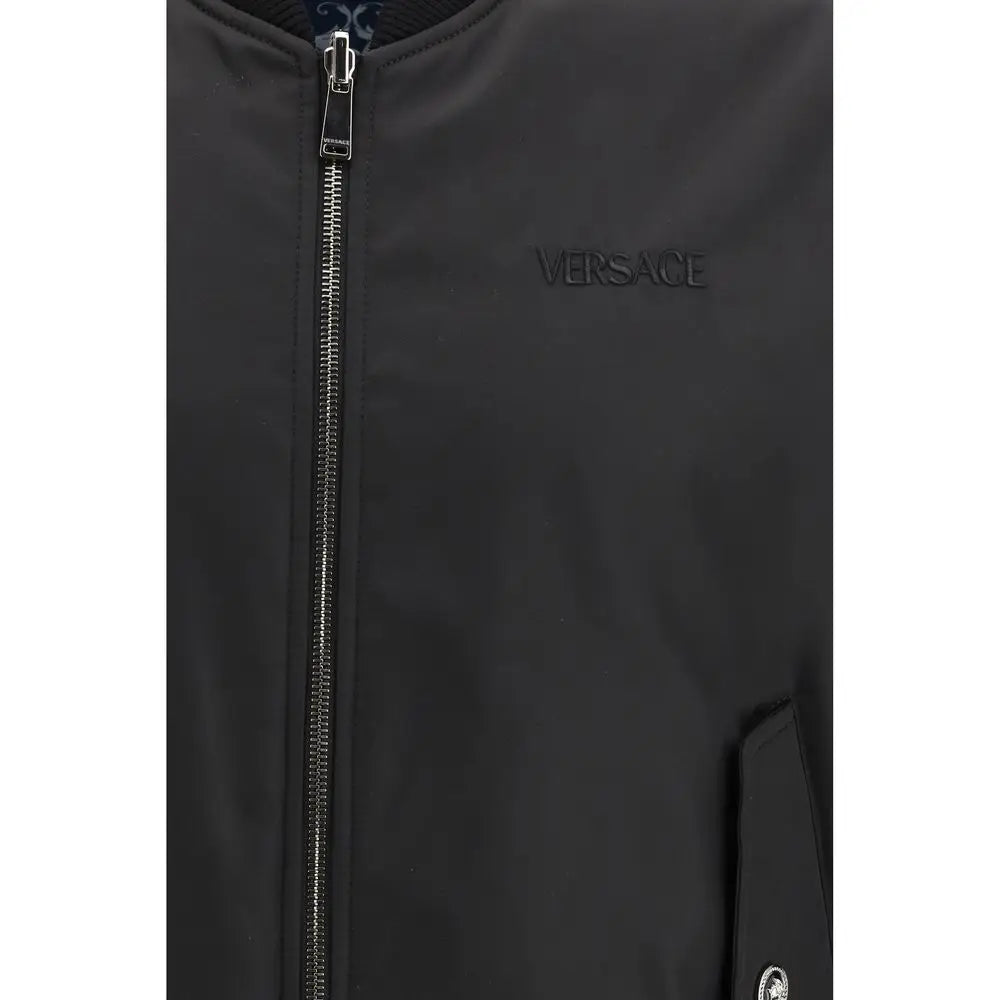 Veste bomber versace noire en polyamide avec fermeture éclair argentée et logo brodé discret