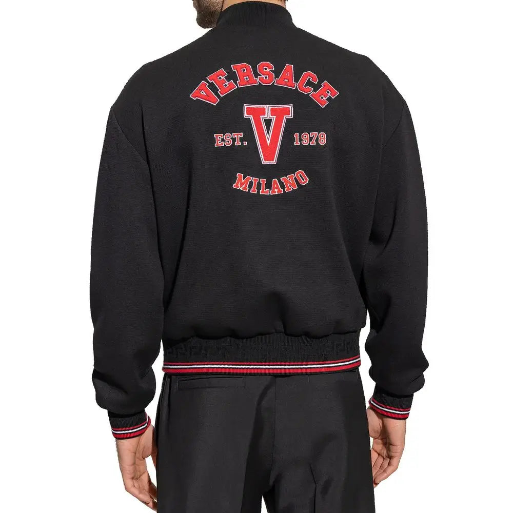 Blouson aviateur versace noir en laine vierge avec logo brodé rouge et bordure rouge