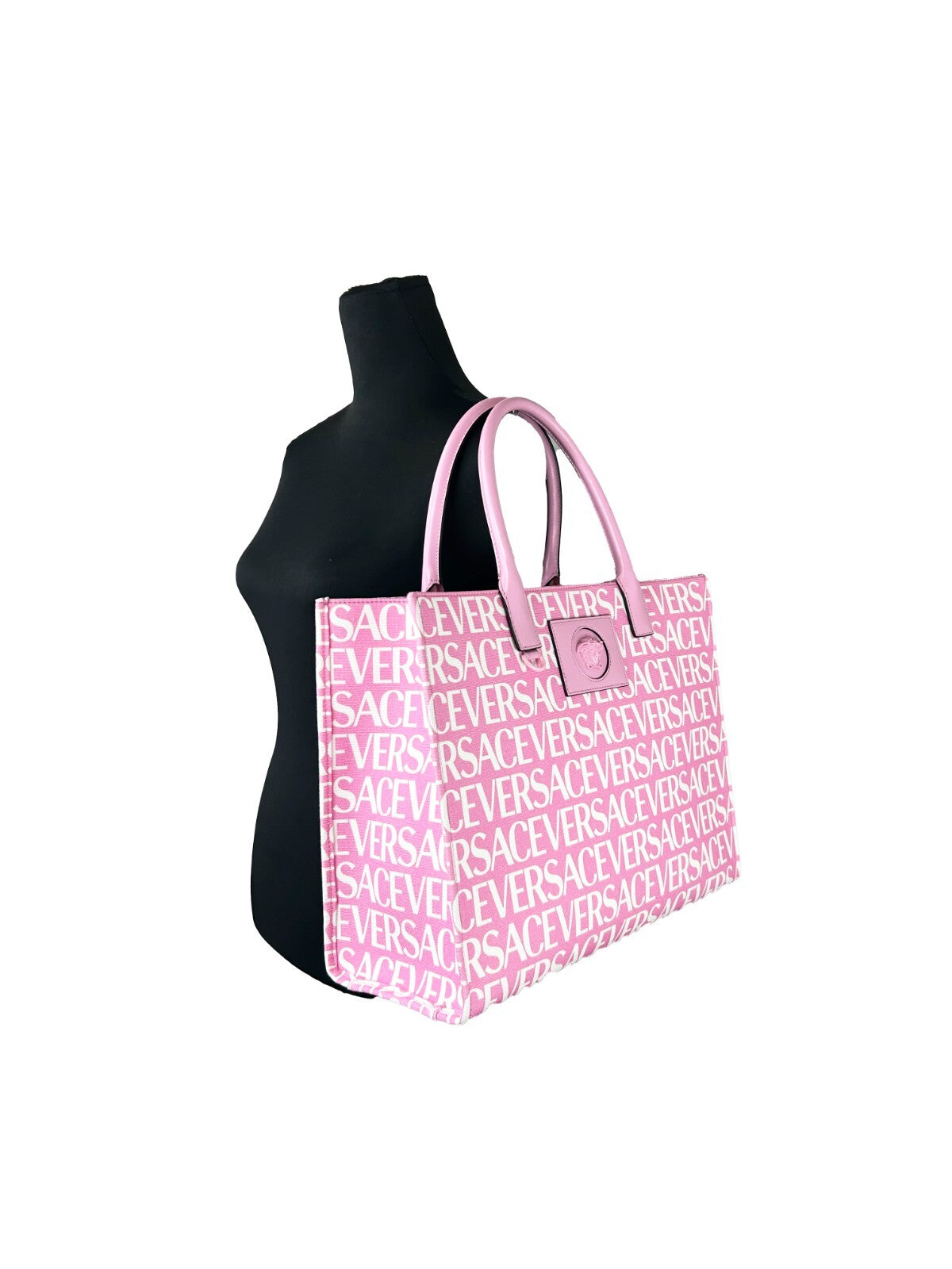 Grand sac tote en toile de coton rose pâle avec logo Medusa de Versace, design élégant et spacieux pour tous les jours.