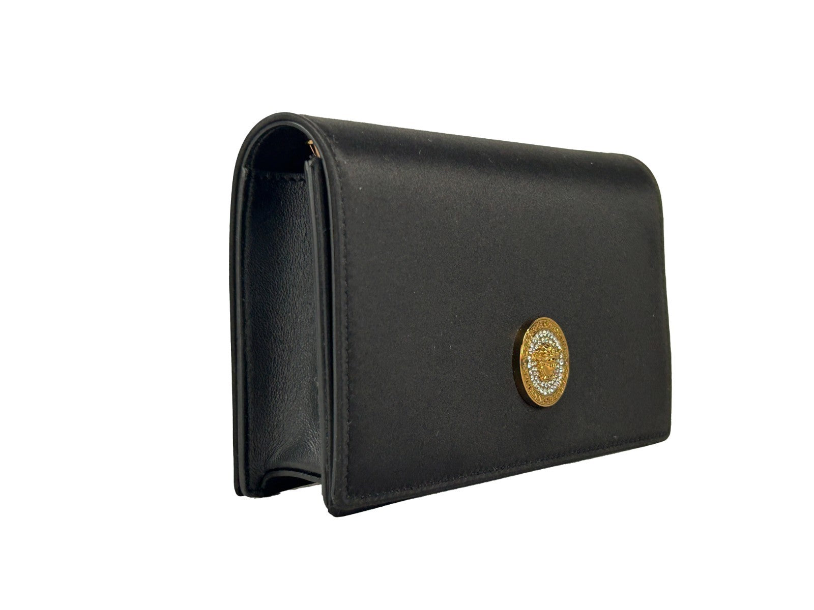 Petite sacoche à chaîne noire Versace, porte-monnaie croisée en cuir avec logo emblématique et détails élégants.