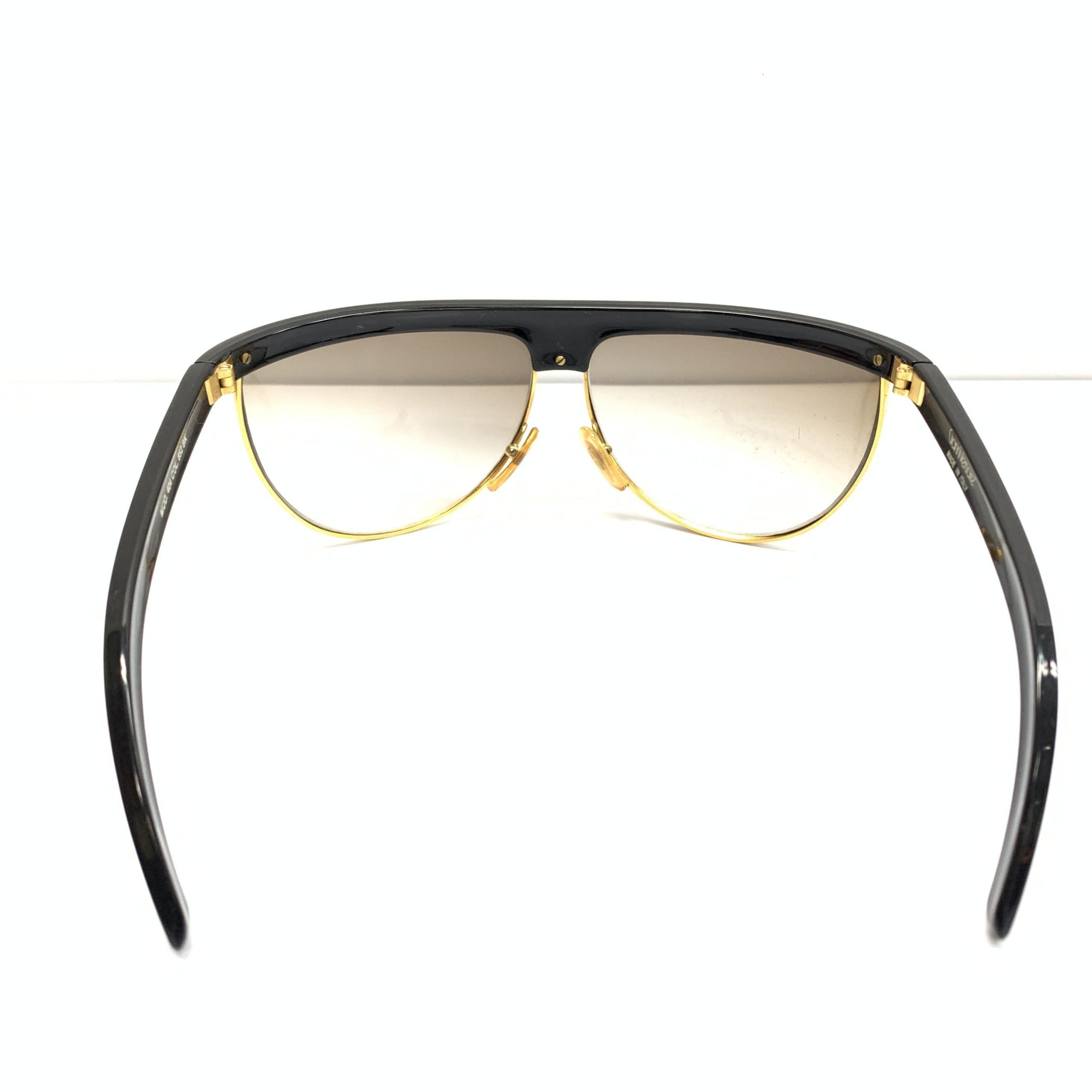 Lunettes de sport polarisées Versace Versache avec monture élégante et verres protecteurs, adaptées pour une utilisation active.