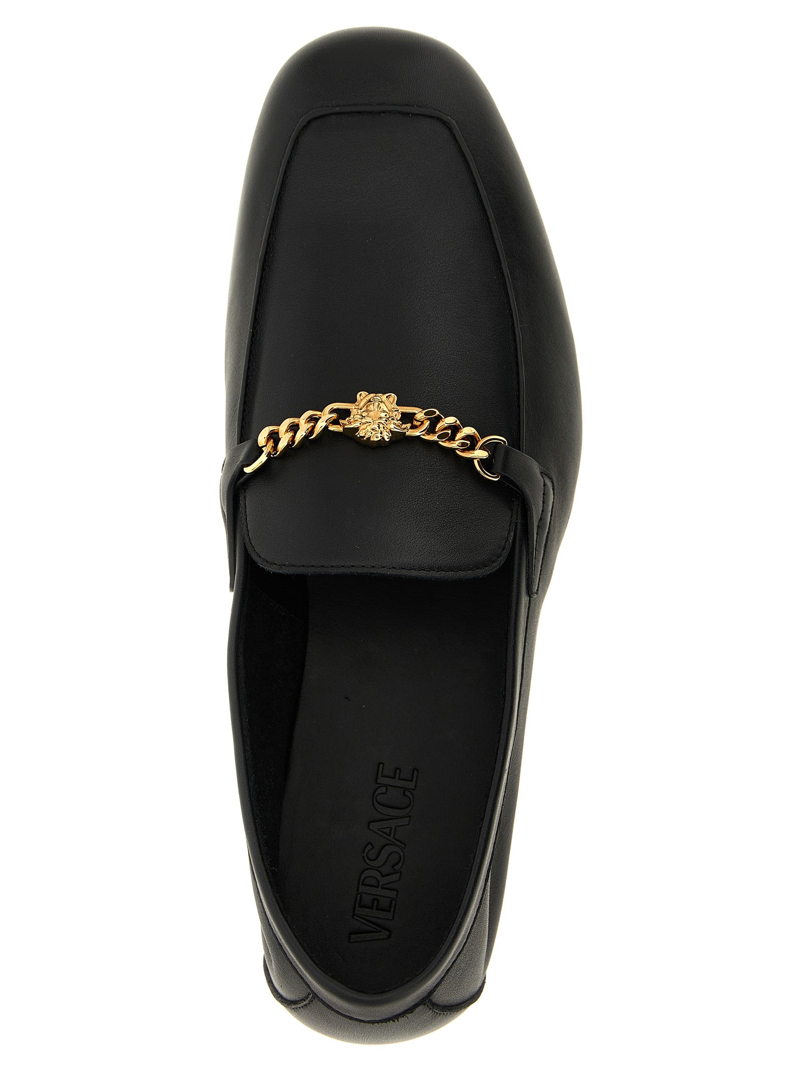 Mocassins slip-on en cuir de veau noir de Versace, élégants et sophistiqués, pour homme.