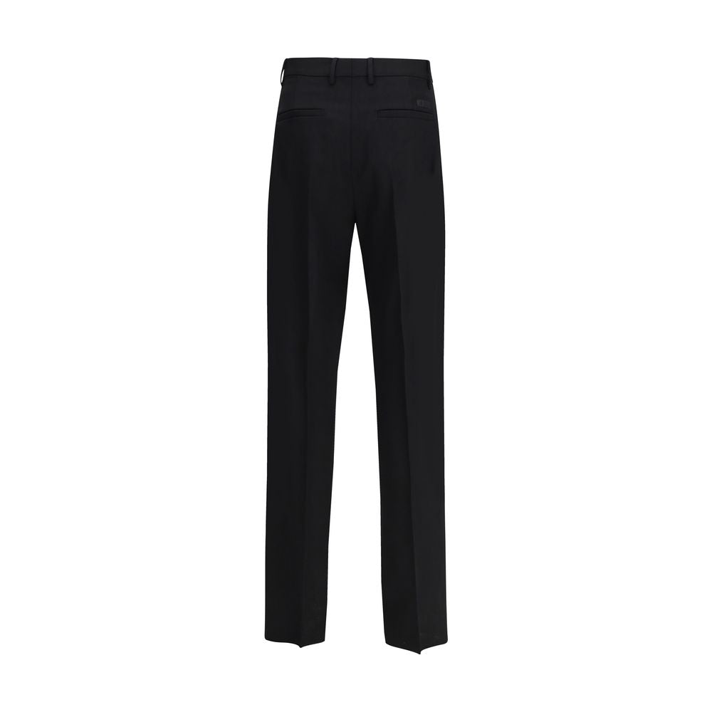 Pantalon de costume en laine noire Versace Aries, coupe élégante et ajustée, pour homme.