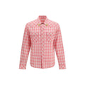 Chemise multicolore en coton Versace avec motif coloré et logo distinctif, portée sur mannequin.