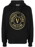 Sweat à capuche versace jeans noir en coton avec logo circulaire doré audacieux et emblème v couture