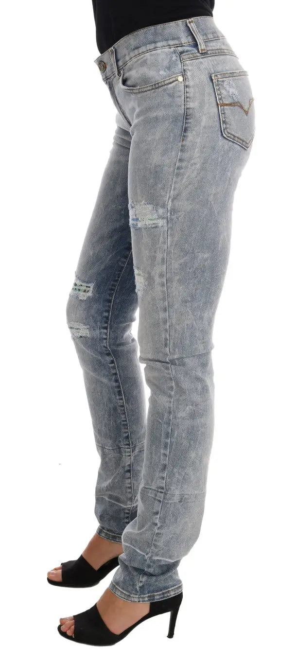 Jean slim fit versace light-wash en denim stretch avec détails déchirés et effet usé bleu clair