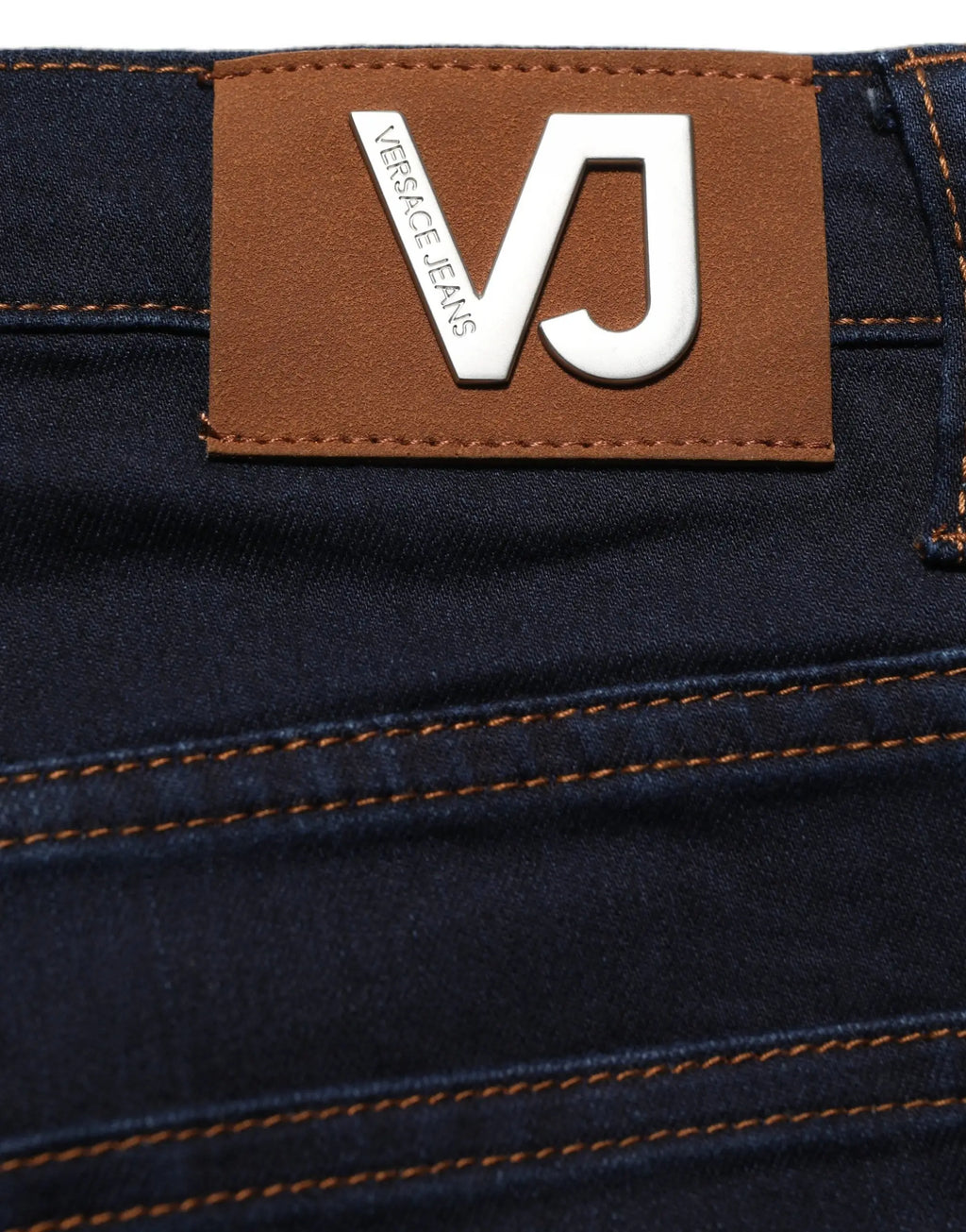 Jean denim skinny taille haute bleu versace jeans couture avec patch cuir marron logo vj au dos