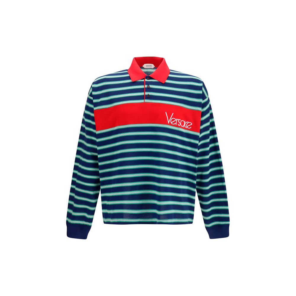 Chemise polo multicolore en coton de la marque Versace, visible avec motifs colorés et design élégant.