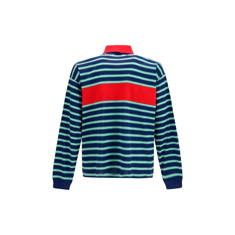 Chemise polo multicolore en coton de Versace, vue de face, avec logo distinctif et détails colorés.