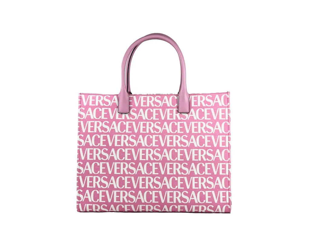 Grand sac cabas versace medusa rose bébé en toile avec imprimé logo blanc répété et poignées assorties