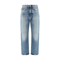 Jeans en denim coton bleu de la marque Versace, coupe classique et détails de luxe, affichés sur un modèle.