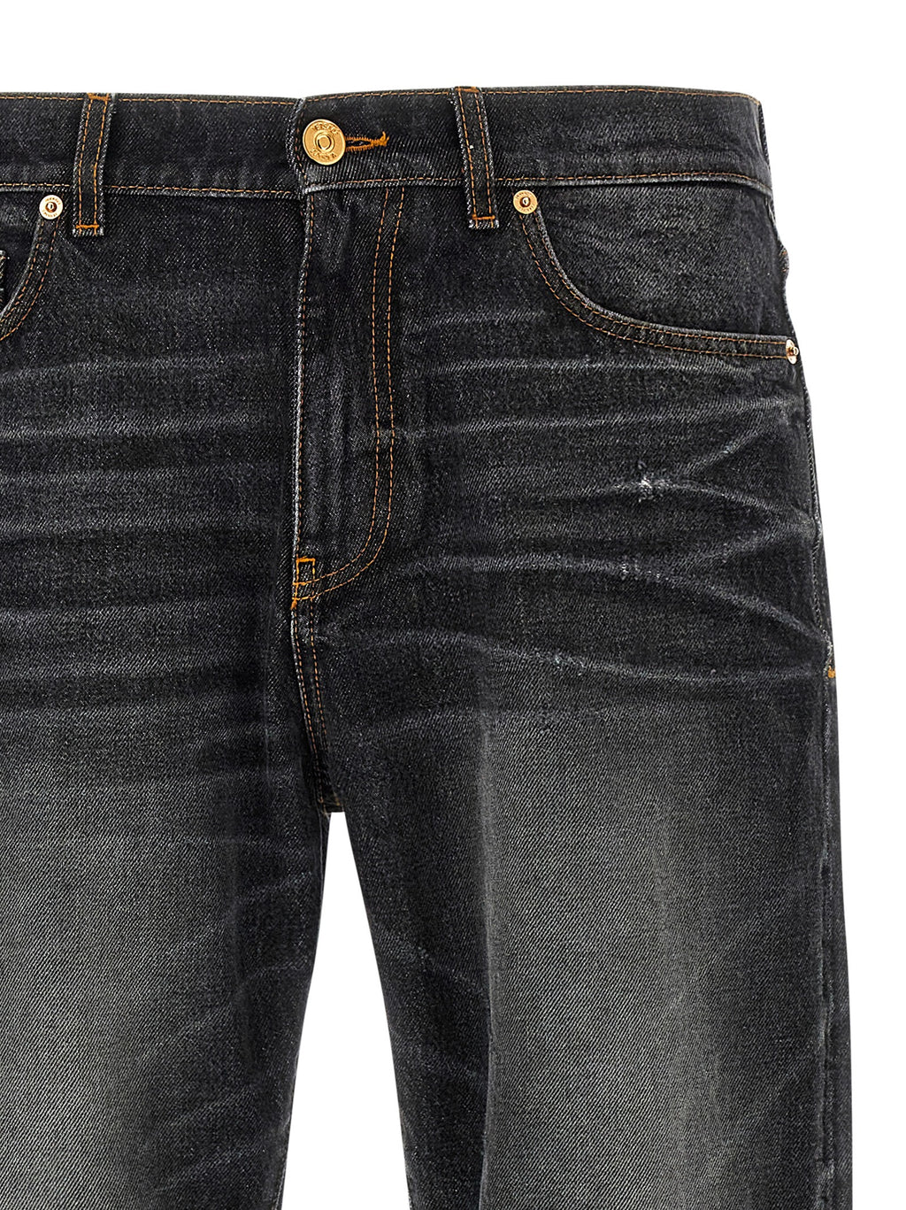 Jeans droits en coton noir de la marque Versace, détail élégant et coupe classique, visibles sur l'image.