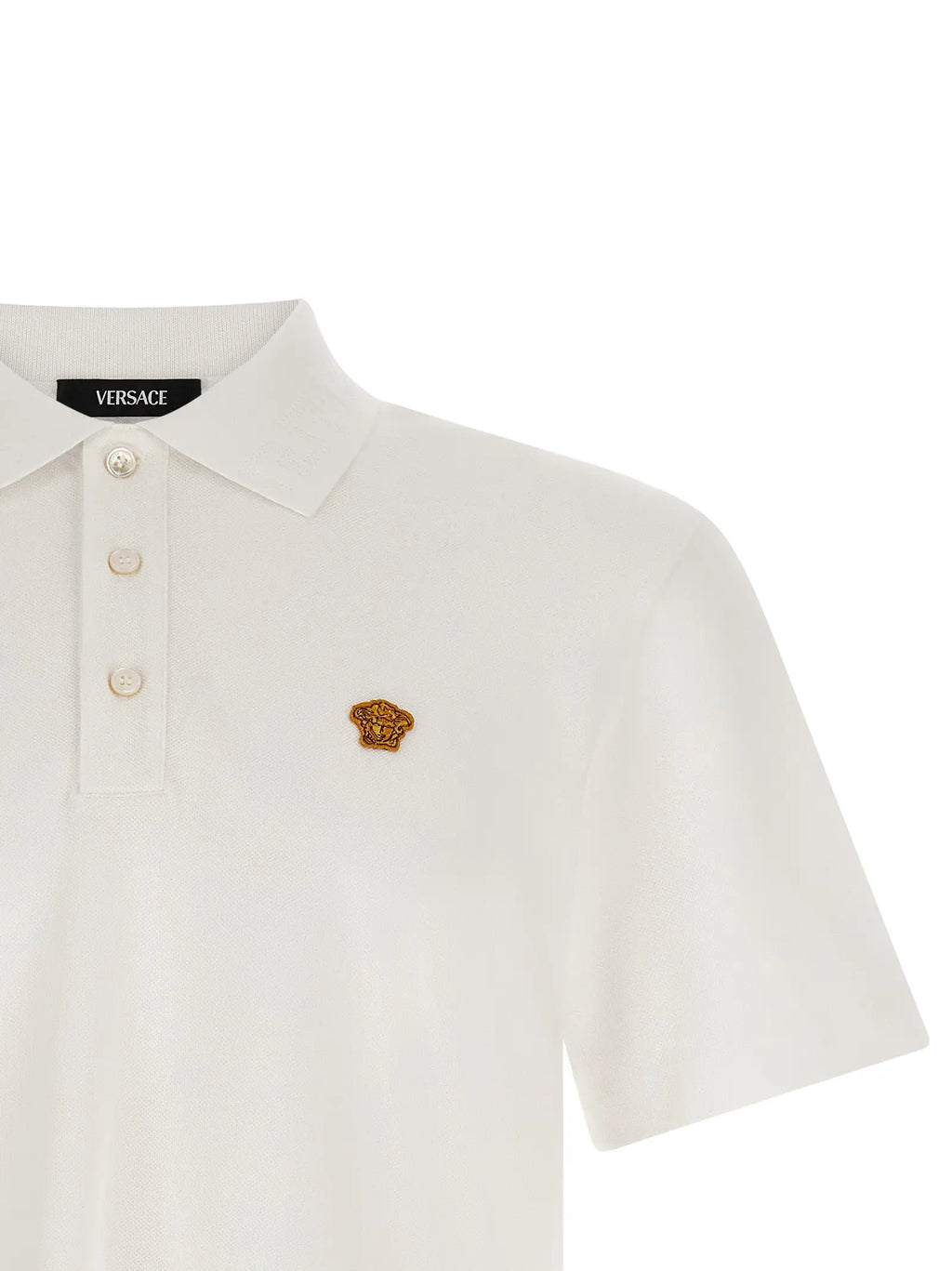 Versace polo blanc en coton avec emblem meduse dore sur la poitrine et boutons assortis